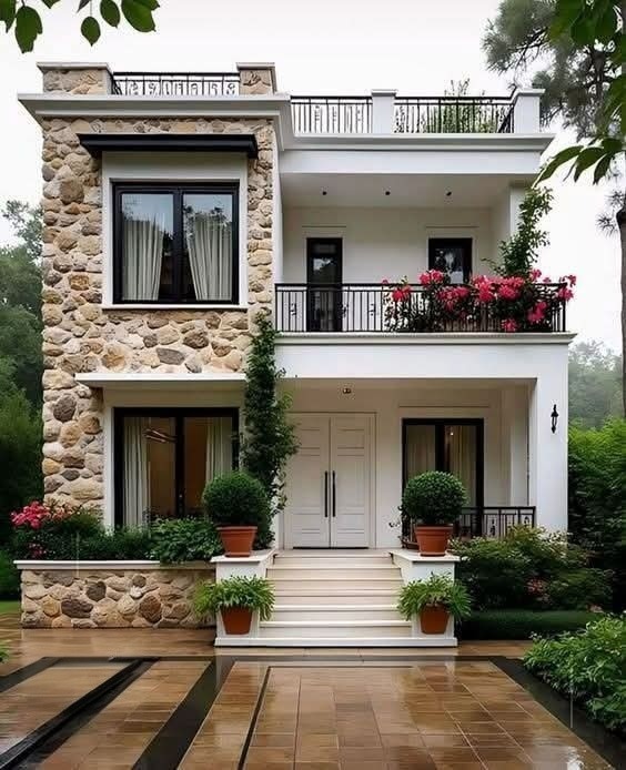 Stone Haven heritage bungalow villa with natural stone masonry by Sylvia Projects